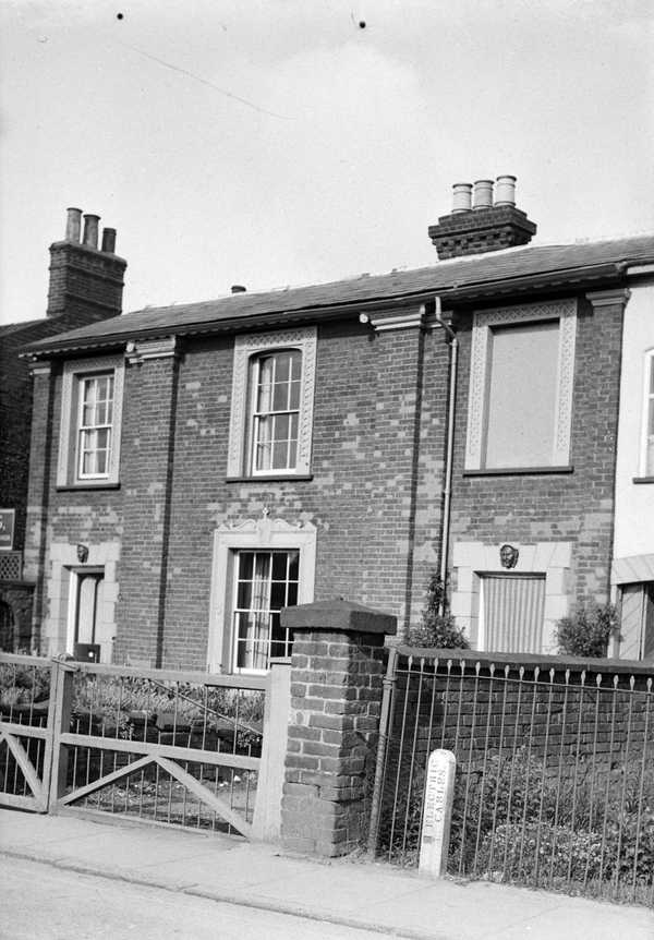 Photograph of a row of houses possibly in Wisbech, Cambridgeshire