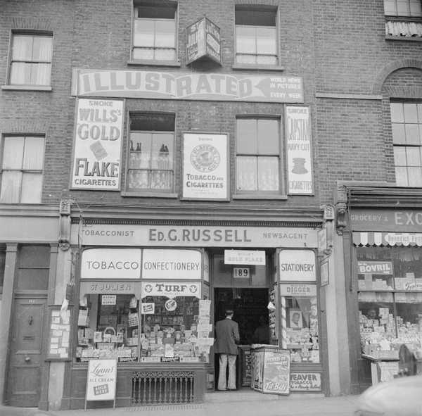 Photograph showing shop front of Ed. G. Russell, newsagents and ...