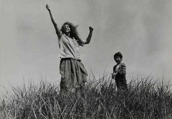 Mary and Pablo in high grass