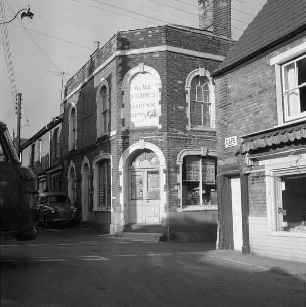 Photograph of shop front of Alma Stores, shipping supplies, in Wivenhoe