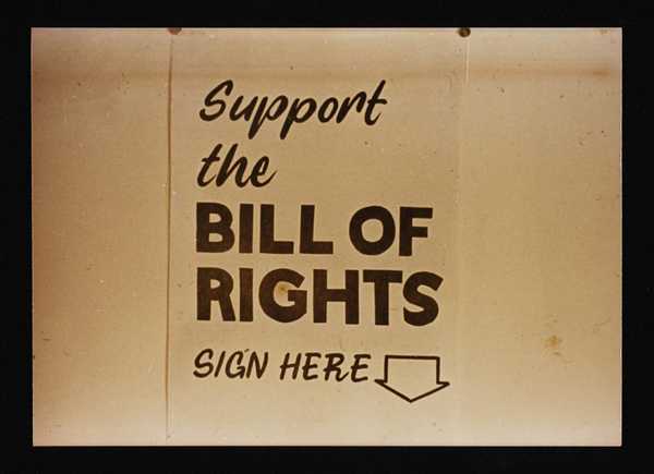 Colour photograph of a poster with the words, ‘Support the Bill of ...