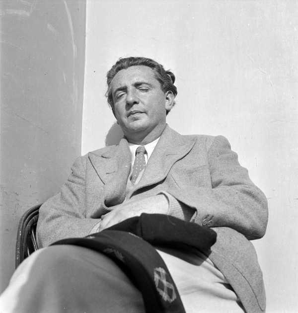 ‘Photograph of Joseph Bard sitting against a wall with his eyes closed ...