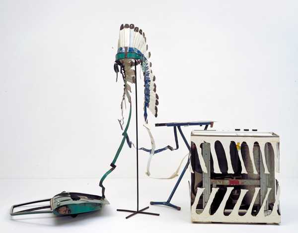 Car Door, Ironing Board and Twin-Tub with North American Indian Head-Dress