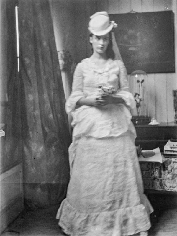 Black and white negative of Angelica Bell standing dressed as Ellen ...