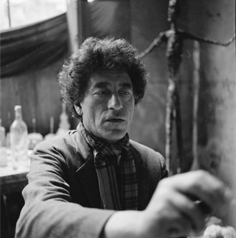 Giacometti painting in his studio, ca. 1954