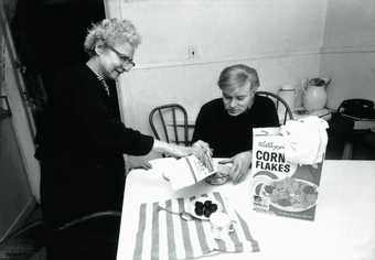 Black and white photograph of Warhol and his mother