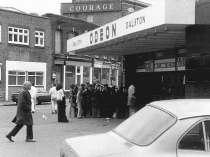 John Smith The Girl Chewing Gum 1976 (film still)