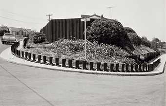 Eleanor Antin black and white photograph of 100 Boots Turn the Corner
