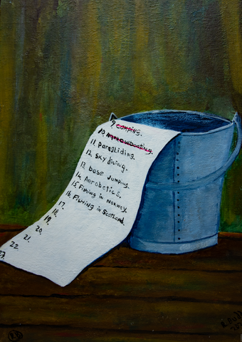 a bucket on a wooden floor with a list coming out of it