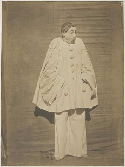 A white clown stands looking surprised