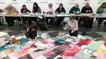 Image of children collaging paper
