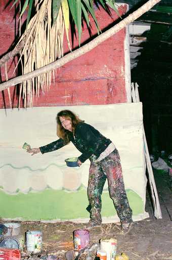 Vivian Suter painting at night outside one of her studios in Panajachel, Guatemala
