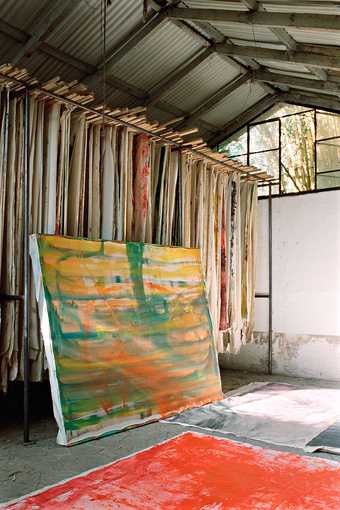 Photograph of storage and working spaces in the two studios that Vivian Suter has built