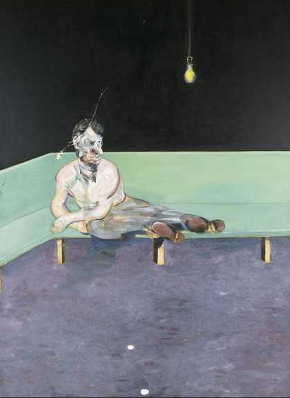 a man sits on a chair
