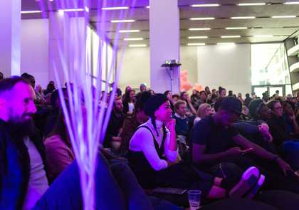 People listening to a talk