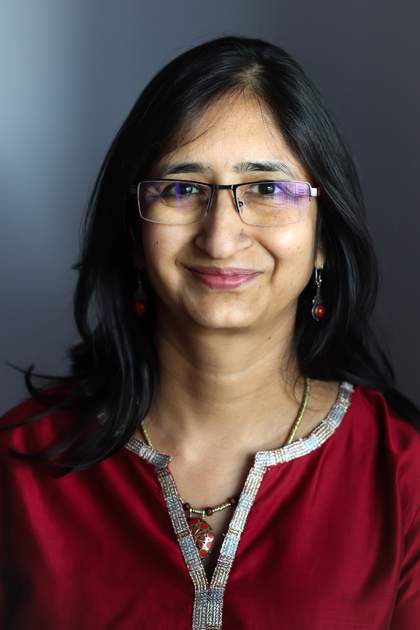 A woman looks to camera