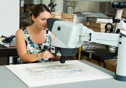 A Tate conservator at work