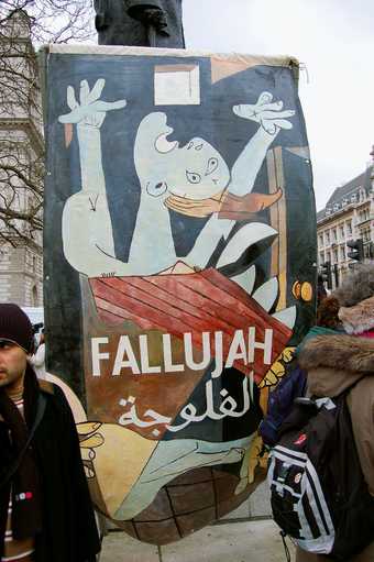 Photograph of protesters demonstrating in London against the American air strikes in Fallujah, Iraq (2004)