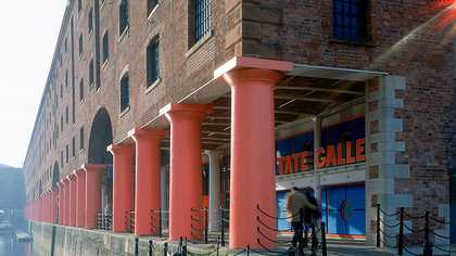Tate Liverpool exterior with couple approaching gallery