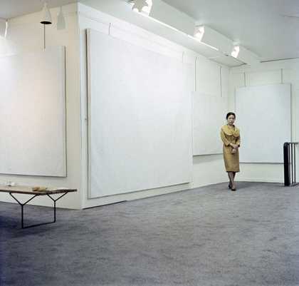 Yayoi Kusama with works from her Infinity Net series at the Stephen Radich Gallery, New York, 1961