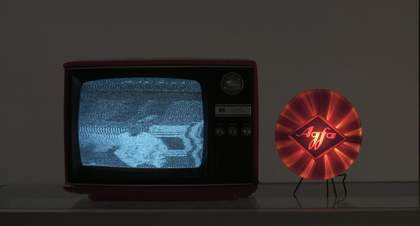 A TV set with a fuzzy black and white image 