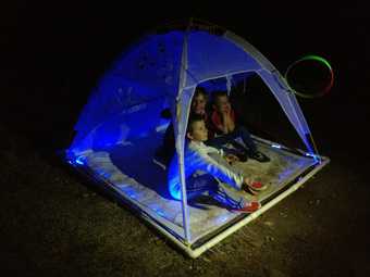 La Lune by Bonita Ely - a light up sculpture of a tent in the darkness 