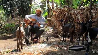 Jacques Coetzer Playing Guitar for Goats 2010 film still