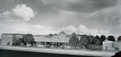 Image of a black and white photo of an architect's model for a new extension.