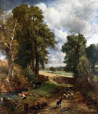A painting of a country lane on a sunny day, with a dog in the foreground driving sheep towards a cornfield. Tall trees rise on either side of the lane, and to the left a shepherd boy lies down next to a stream to drink.