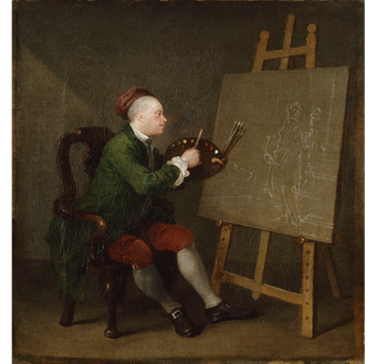 A person sits on a chair holding a paintbrush and palette up to a canvas positioned on an easel