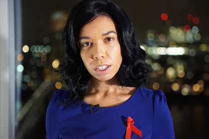 portrait of woman with faded city sky line in the background