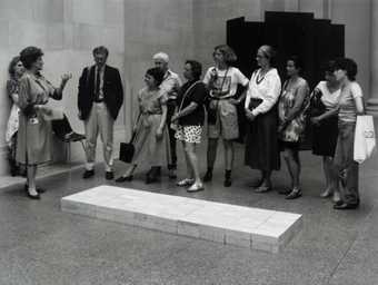 Tate Gallery visitors viewing Carl Andre’s sculpture Equivalent VIII 1966