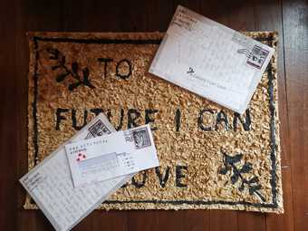 Letter on a doormat, reading A Future I Can Love