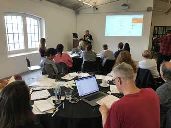 A group participates in a mapping session