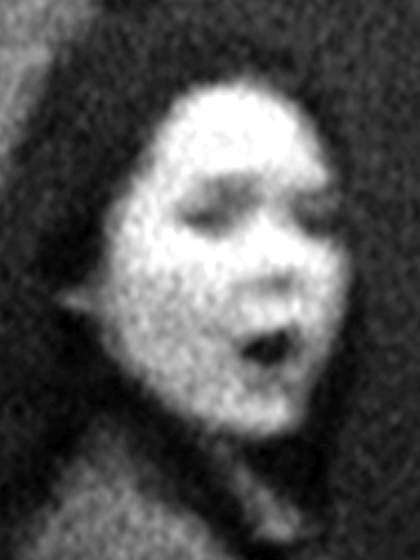 Photographic enlargement of the face of the girl from John Smith's The Girl Chewing Gum 1976