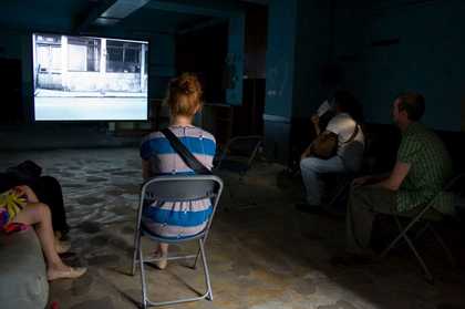 Installation view of John Smith's The Girl Chewing Gum 1976 at the sixth Berlin Biennale for Contemporary Art, June–August 2010