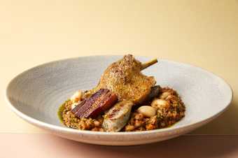 Dish of food showing duck, sausage and brioche crumbs