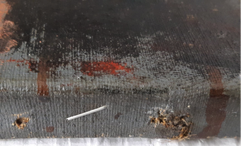 Detail of fig.6 showing tacking margins with two red paint drips that may suggest that the painting was first painted unstretched