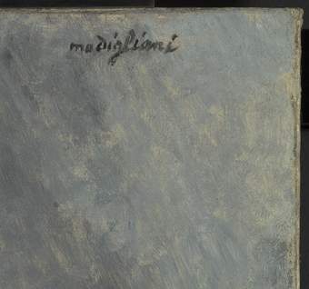 Close-up detail showing dark grey, blue and white paint along with the artist’s signature in black (‘modigliani’, with a lowercase ‘m’) and two edges of the canvas at a corner