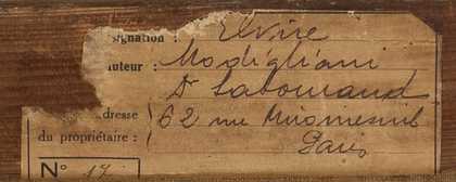 Partially torn, discoloured label stuck to wood with handwritten name of artist, artwork title, name and address of owner.