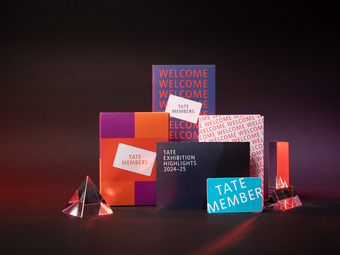 Tate branded membership gifts against a dark background