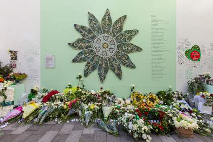 A photograph of a mosaic flower artwork at the unveiling as part of the two-year anniversary of Grenfell in 2019
