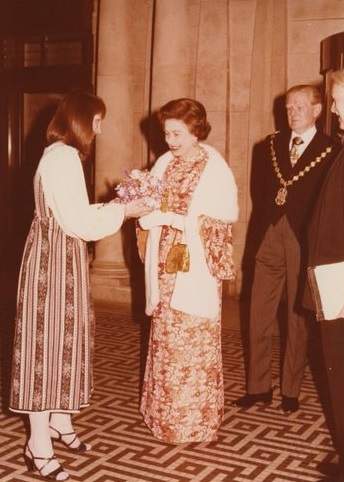 H.M. The Queen presented with a bouquet by Tate Research Assistant, Caroline Odgers, at the 1979 opening of the North East Quadrant extension.