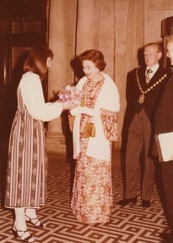 H.M. The Queen presented with a bouquet by Tate Research Assistant, Caroline Odgers, at the 1979 opening of the North East Quadrant extension.