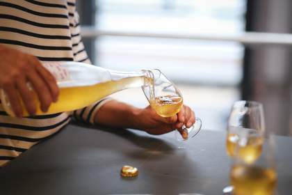 Photo showing ice cider being poured from the bottle