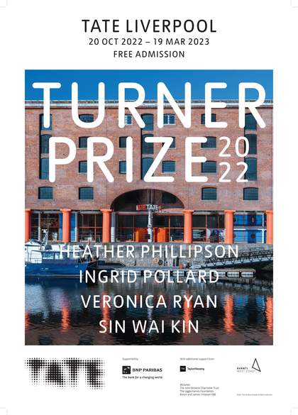 Water and boats in front of a brick wharf building with columns holding up the fasade. The text 'Turner Prize 2022' and four artists names in white overlays the image.