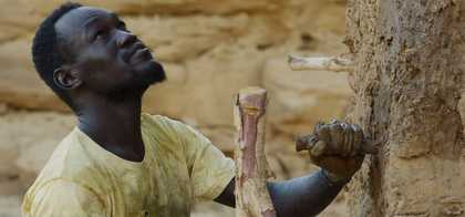 A man against a rock face