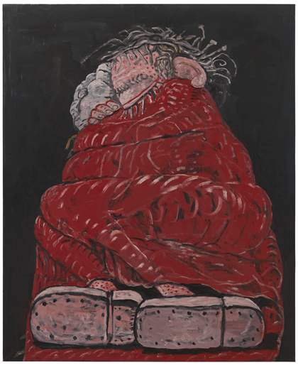 figure sleeping on bed covered by red duvet