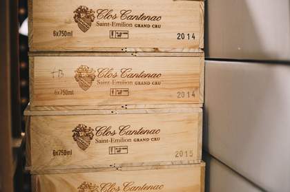 Photograph showing stacked wine boxes