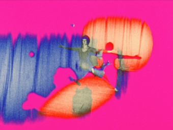 On a bright pink background are multiple images of a woman with her arms outstretched, she has short dark hair and a black long sleeve top. On top of her image are washes of orange and blue colour